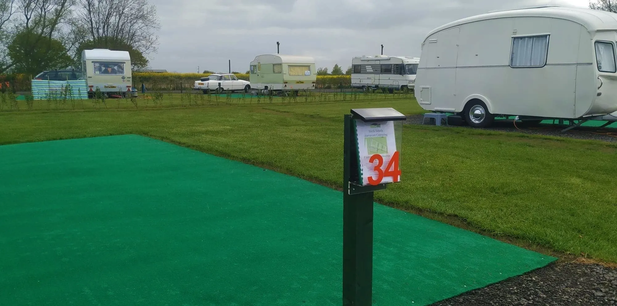 Pitch 34 with its AstroTurf awning bay and service post
